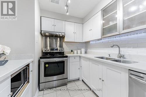 #222 -4005 Don Mills Rd, Toronto, ON - Indoor Photo Showing Kitchen With Double Sink