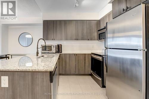 #409 -1235 Bayly St, Pickering, ON - Indoor Photo Showing Kitchen With Upgraded Kitchen