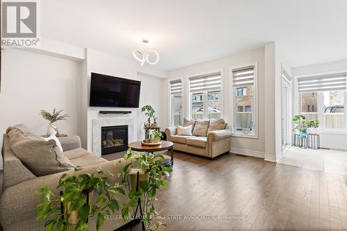 80 Tesla Cres, East Gwillimbury, ON - Indoor Photo Showing Living Room With Fireplace
