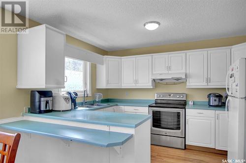 2758 Kliman Crescent, Regina, SK - Indoor Photo Showing Kitchen With Double Sink