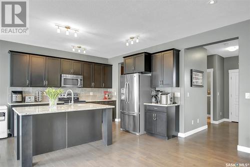 5447 Universal Crescent, Regina, SK - Indoor Photo Showing Kitchen With Upgraded Kitchen