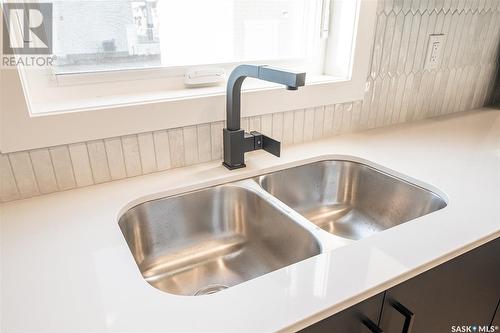 126 Taube Avenue, Saskatoon, SK - Indoor Photo Showing Kitchen With Double Sink