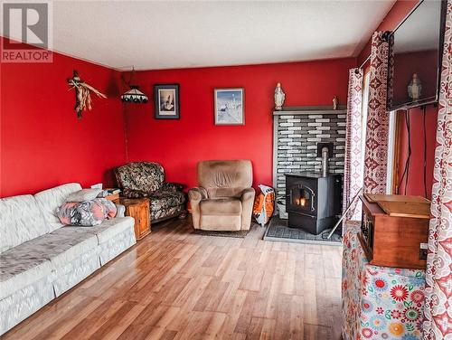 7707 Highway 17E, Markstay-Warren, ON - Indoor Photo Showing Living Room With Fireplace