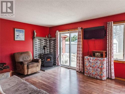 7707 Highway 17E, Markstay-Warren, ON - Indoor Photo Showing Living Room With Fireplace