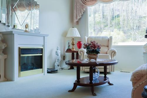 224 Currie Street, Warfield, BC - Indoor With Fireplace