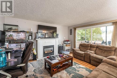 229 Dupre Avenue, Prince George, BC - Indoor Photo Showing Living Room With Fireplace