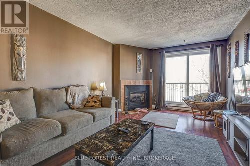 #85 -1096 Jalna Blvd, London, ON - Indoor Photo Showing Living Room With Fireplace