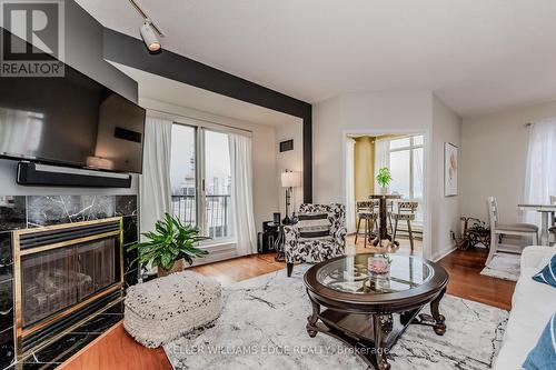 #504 -430 Pearl St, Burlington, ON - Indoor Photo Showing Living Room With Fireplace