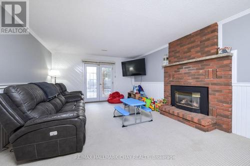 61 Doner St, New Tecumseth, ON - Indoor Photo Showing Living Room With Fireplace