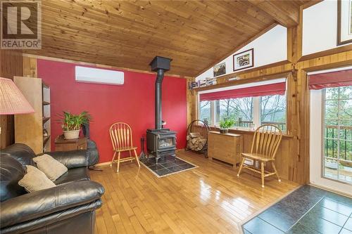 238 Seapoint Lane, Westport, ON - Indoor Photo Showing Living Room With Fireplace