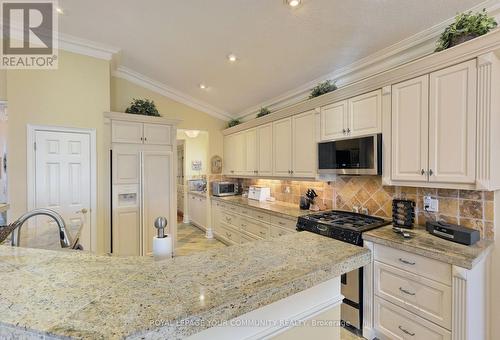 158 Legendary Trail, Whitchurch-Stouffville, ON - Indoor Photo Showing Kitchen With Fireplace With Double Sink