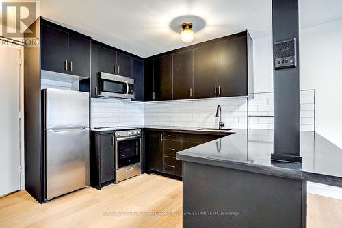 #408 -420 Eglinton Ave E, Toronto, ON - Indoor Photo Showing Kitchen With Upgraded Kitchen