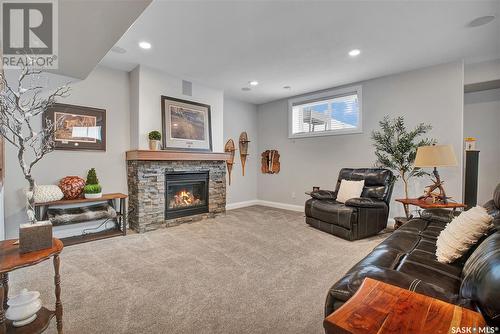 110 Gillies Lane, Saskatoon, SK - Indoor Photo Showing Living Room With Fireplace