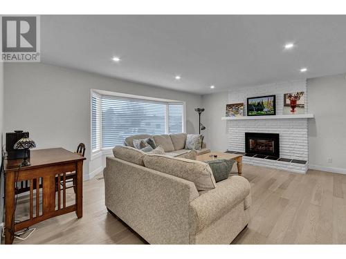 614 Otter Crescent, Prince George, BC - Indoor Photo Showing Living Room With Fireplace