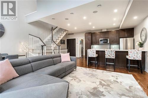 Main level living room features cathedral ceilings - 129 Eye Bright Crescent, Ottawa, ON - Indoor