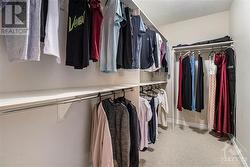 Upper level walk-in closet to the primary room - 