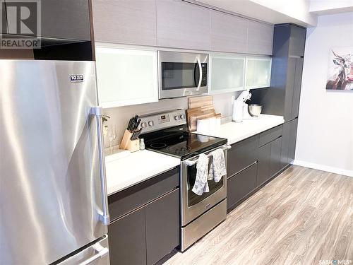 111 235 Evergreen Square, Saskatoon, SK - Indoor Photo Showing Kitchen With Stainless Steel Kitchen