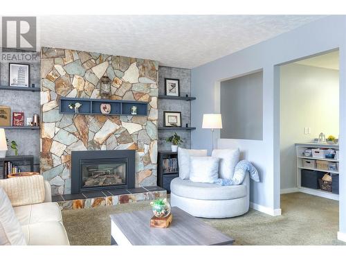 3506 42A Avenue, Vernon, BC - Indoor Photo Showing Living Room With Fireplace