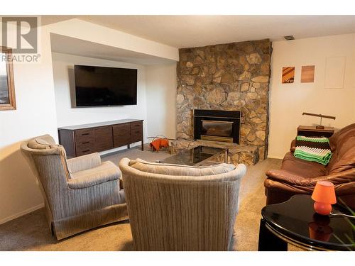 1738 Smithson Drive, Kelowna, BC - Indoor Photo Showing Living Room With Fireplace