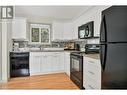 6999 Terazona Drive, Kelowna, BC  - Indoor Photo Showing Kitchen With Double Sink 