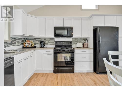6999 Terazona Drive, Kelowna, BC - Indoor Photo Showing Kitchen With Double Sink