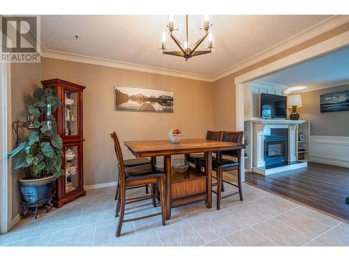 2760 25Th Avenue Ne, Salmon Arm, BC - Indoor Photo Showing Dining Room With Fireplace