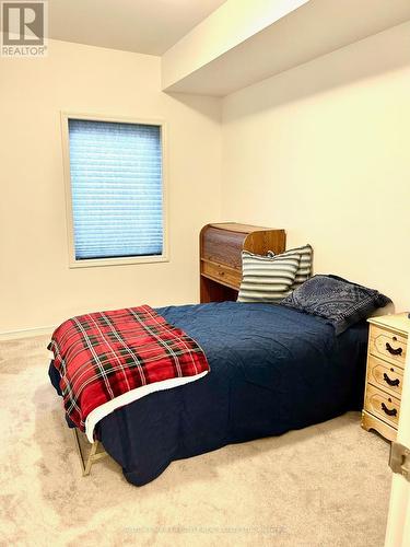 106 - 910 Wentworth Street, Peterborough (Otonabee), ON - Indoor Photo Showing Bedroom