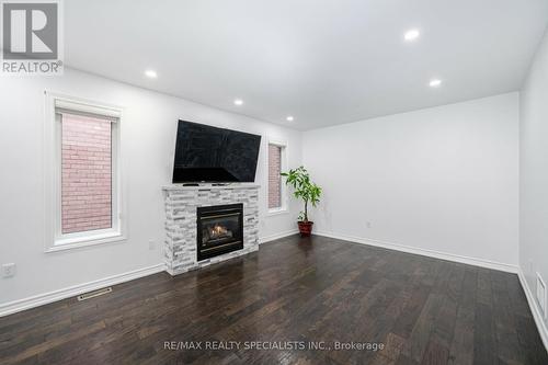 23 Tigerlily Place, Brampton, ON - Indoor Photo Showing Living Room With Fireplace