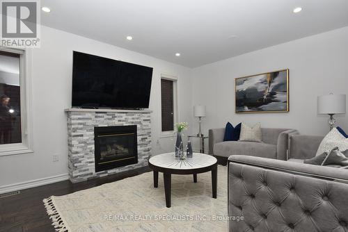 23 Tigerlily Place, Brampton, ON - Indoor Photo Showing Living Room With Fireplace