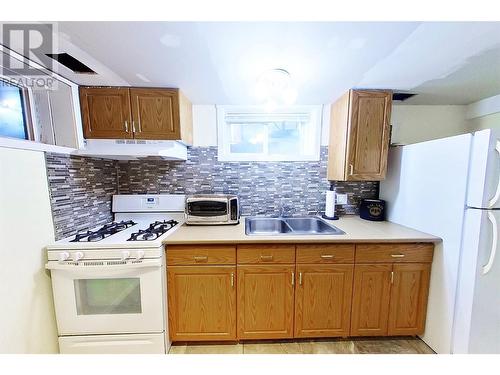 4396 Beach Avenue, Peachland, BC - Indoor Photo Showing Kitchen With Double Sink
