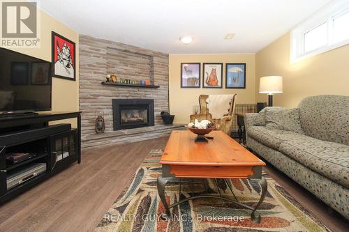 950 Silverdale Road, Peterborough, ON - Indoor Photo Showing Living Room With Fireplace