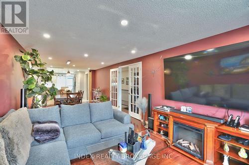 18 Girdwood Dr, Barrie, ON - Indoor Photo Showing Living Room With Fireplace