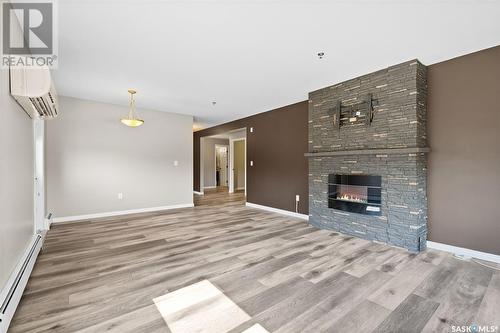 102 600 Centennial Boulevard, Warman, SK - Indoor With Fireplace