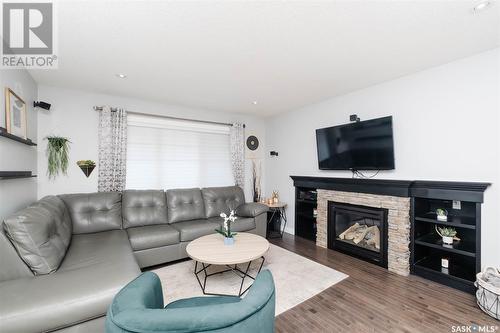 5104 Aerial Crescent, Regina, SK - Indoor Photo Showing Living Room With Fireplace