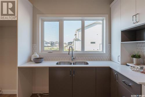 134 Taube Avenue, Saskatoon, SK - Indoor Photo Showing Kitchen With Double Sink