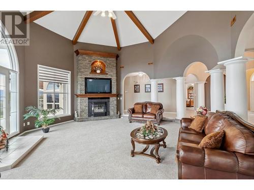 5795 Dixon Dam Road, Vernon, BC - Indoor Photo Showing Living Room With Fireplace