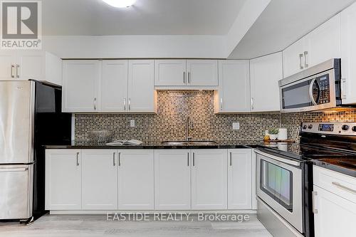65 - 125 Shaughnessy Boulevard, Toronto, ON - Indoor Photo Showing Kitchen With Upgraded Kitchen