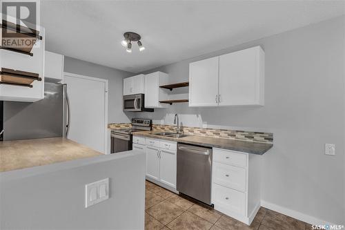 204 2931 Harding Street, Regina, SK - Indoor Photo Showing Kitchen With Double Sink