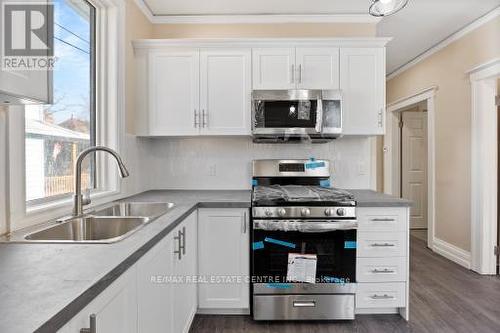 215 Curry Ave, Windsor, ON - Indoor Photo Showing Kitchen With Double Sink