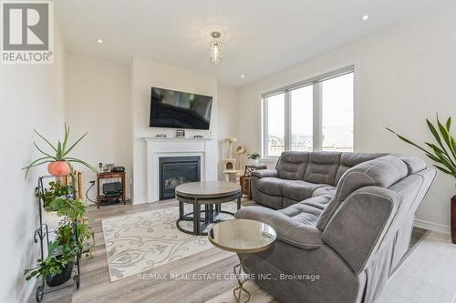 128 Farley Rd, Centre Wellington, ON - Indoor Photo Showing Living Room With Fireplace