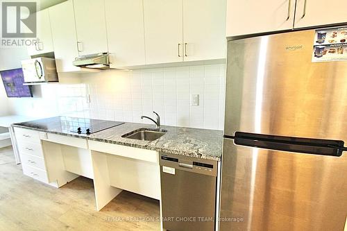 303 - 1800 Simcoe Street N, Oshawa, ON - Indoor Photo Showing Kitchen With Stainless Steel Kitchen With Upgraded Kitchen