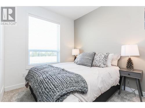 610 Academy Way Unit# 36, Kelowna, BC - Indoor Photo Showing Bedroom