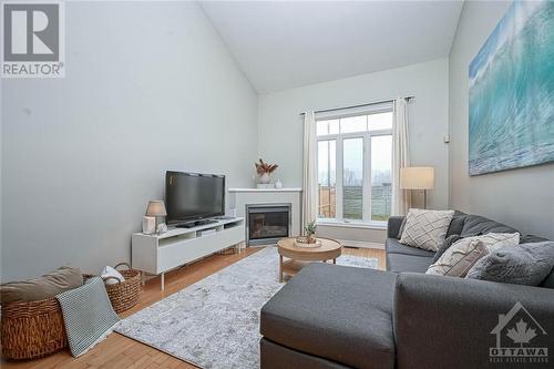 176 Eye Bright Crescent, Ottawa, ON - Indoor Photo Showing Living Room With Fireplace