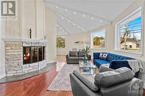 6974 Bank Street, Ottawa, ON - Indoor Photo Showing Living Room With Fireplace