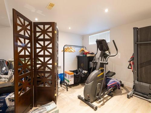 Chambre Ã Â coucher - 810 Rue Des Aulnaies, Pincourt, QC - Indoor Photo Showing Gym Room