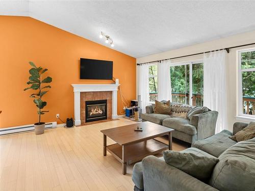 A-4018 Otter Point Rd, Sooke, BC - Indoor Photo Showing Living Room With Fireplace