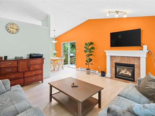 A-4018 Otter Point Rd, Sooke, BC - Indoor Photo Showing Living Room With Fireplace