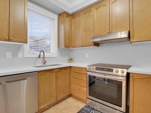 32 Frostbite Lane N, Brampton, ON - Indoor Photo Showing Kitchen With Double Sink