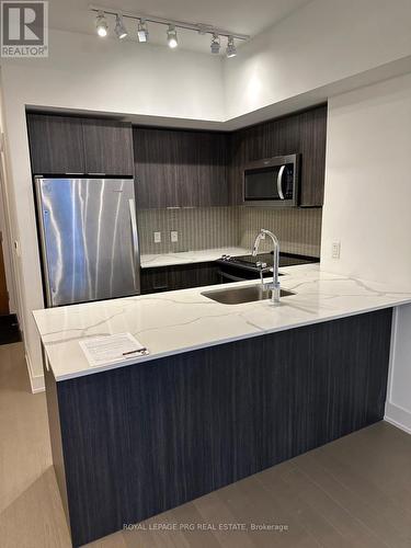 #2309 -20 Shore Breeze Dr, Toronto, ON - Indoor Photo Showing Kitchen With Double Sink With Upgraded Kitchen