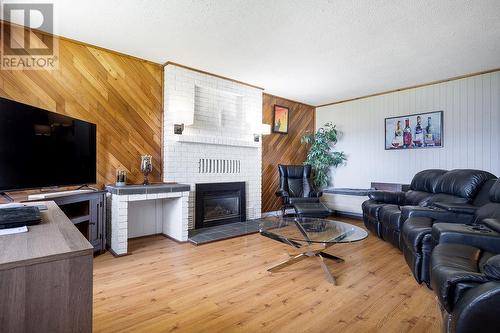 5093 Salmon River Rd Road, Armstrong, BC - Indoor Photo Showing Living Room With Fireplace
